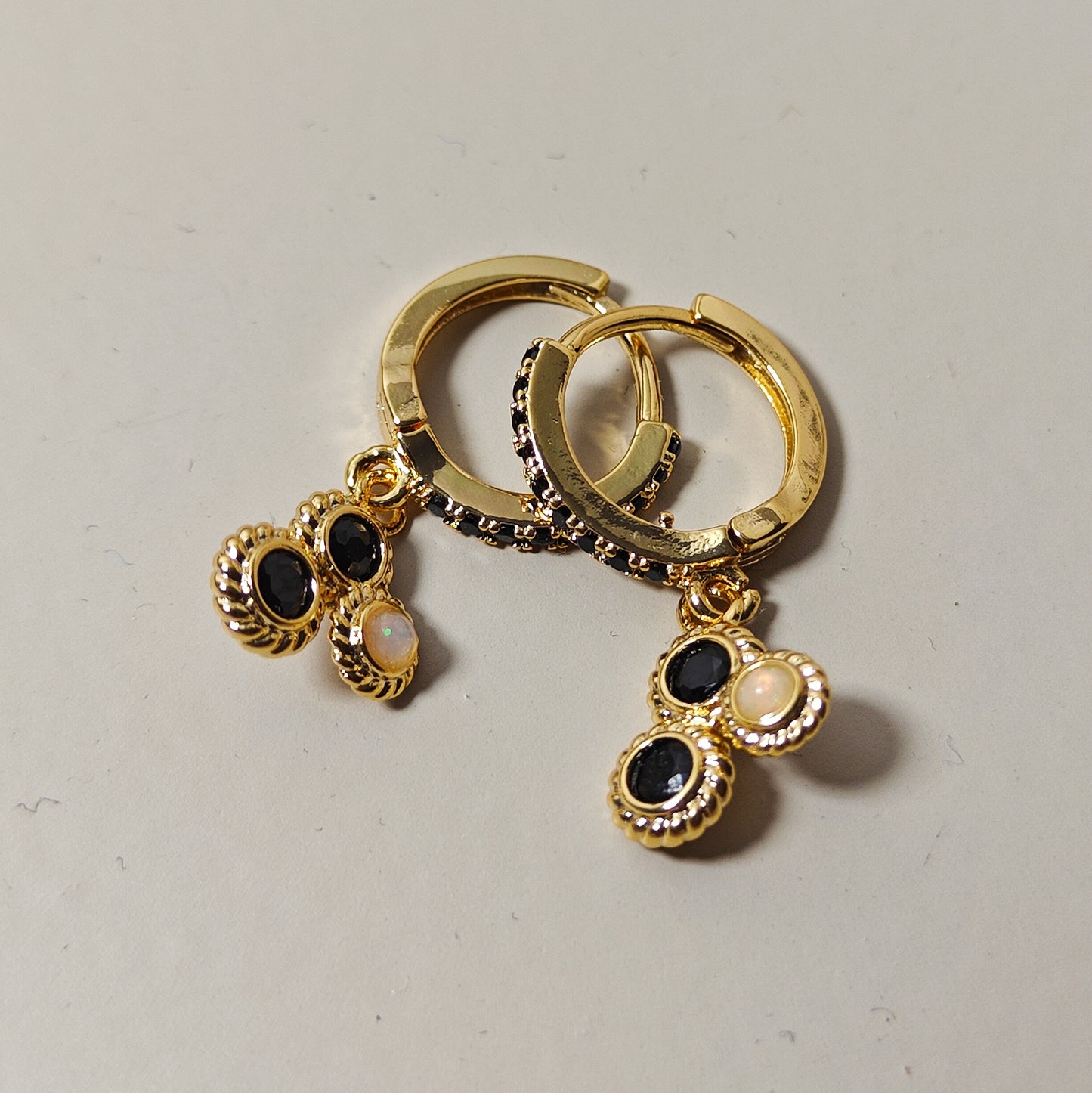 Oorbellen tripple black&gold